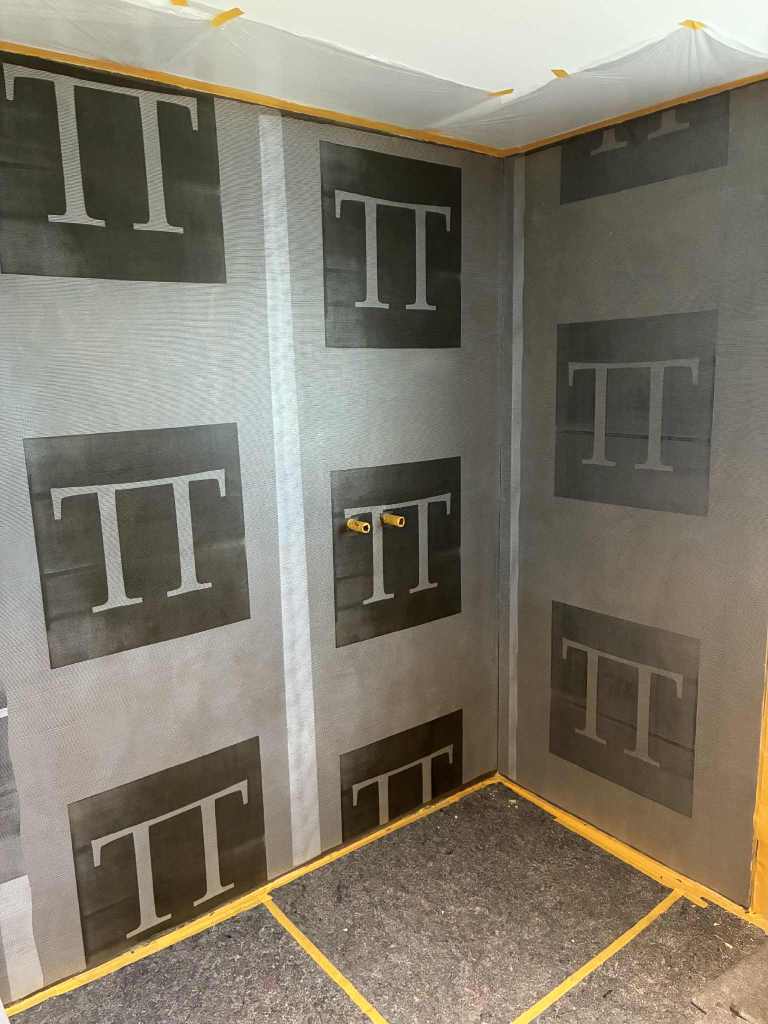 Hier sieht man das Gewebe welches bei unseren fugenlosen Designbädern und Spachtelböden zusätzlich immer mit eingearbeitet wird